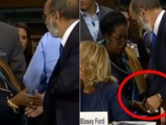 Democrat rep caught slipping mysterious envelope to Dr. Ford's lawyers