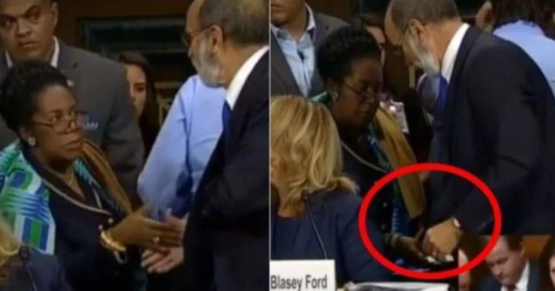 Democrat rep caught slipping mysterious envelope to Dr. Ford's lawyers