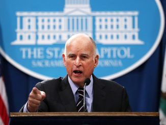 Gov. Jerry Brown says global warming is to blame for California wildfires spreading through the state