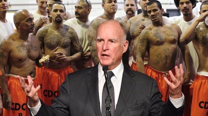 California Gov. Jerry Brown has pardoned a refugee convicted of murder and robbery charges, as well as a Democrat former state senator convicted of felony voter fraud.