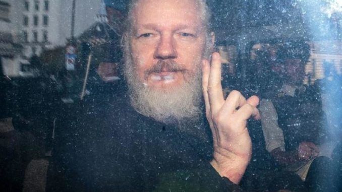 Julian Assange becomes first journalist to be charged under U.S. espionage act