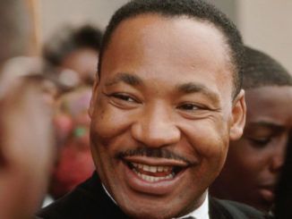 Martin Luther King Jr laughed and offered “advice” as a man “forcibly raped” a woman, according to an FBI summary of a secret tape recording.
