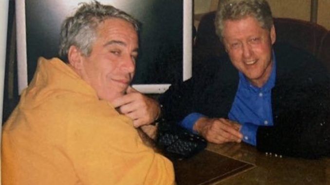A newly resurfaced photograph taken in 2002 shows U.S. President Bill Clinton with billionaire pedophile Jeffrey Epstein.