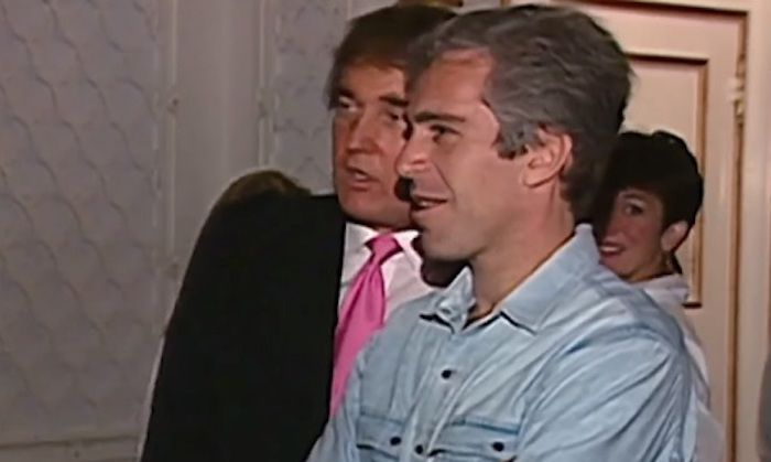 Epstein's child procurer Ghislaine Maxwell pictured standing behind Trump