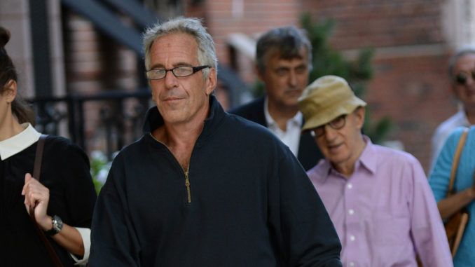Pictures show Woody Allen leaving Jeffrey Epstein's New York mansion