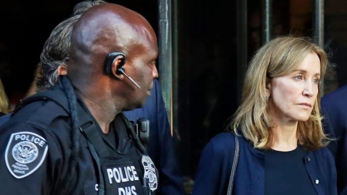 Felicity Huffman jailed in college admissions scandal