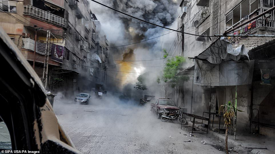 The OPCW is nominally independent, but its annual budget of roughly £75 million is supplied by member states, with much of the money coming from the USA and EU and NATO members, many of them heavily committed to supporting the rebels in Syria. (Above, Douma on April 6, 2018)
