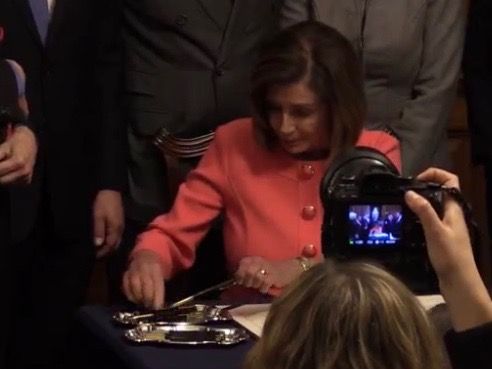 Nancy Pelosi swaps commemorative impeachment pens 