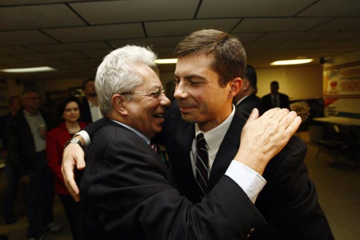Joseph and Pete Buttigieg embrace during the younger Buttigieg's successful mayoral campaign in South Bend, Indiana 