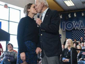 Creepy Joe Biden gave his teenage granddaughter a kiss on the lips while clutching her hand as a crowd of Democrats watched at a campaign event ahead of the upcoming Iowa caucuses.