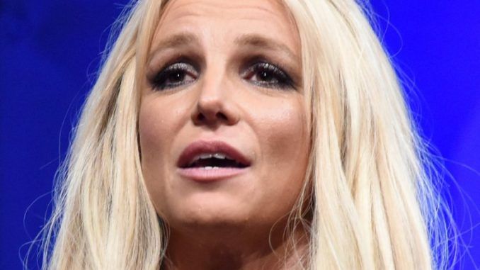 Britney Spears called for a general strike and the redistribution of wealth on Monday, using Instagram to declare "communion [moves] beyond walls" and adding a commonly used socialist symbol to the end of her post.