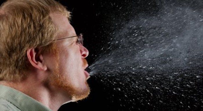 People who deliberately cough in public could face terrorism charges, DOJ warn