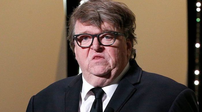 Director Michael Moore claims white men have a responsibility to make amends after Trump era ends