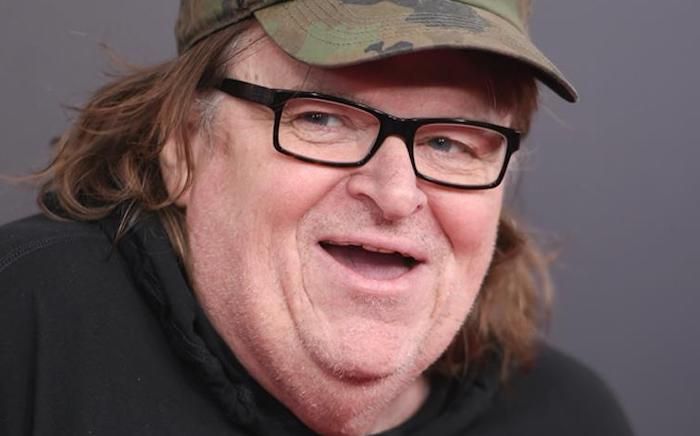 Leftwing filmmaker and activist Michael Moore protested President Trump’s call to “liberate Michigan” by posting violent footage of liberals punching and kicking a Trump mannequin and calling for a party on Election Day.