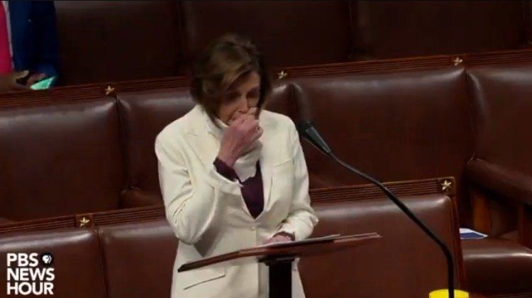 Video shows House Speaker Nancy Pelosi wiping her nose with her bare hand and then wipe it on the shared podium