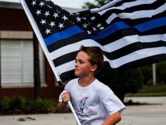 A determined 11-year-old boy has been running a mile for every First Responder that has fallen in the line of duty and donating money to the families of the fallen.