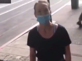 Black Lives Matter goon forces woman to fall to her knees and apologise for being white