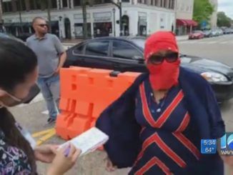 A Democrat senator has been caught "in disguise" at a riot, telling police officers they are not allowed to arrest vandals.