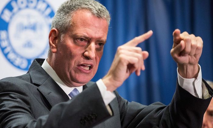 New York City Mayor Bill de Blasio told CNN he is banning all large gatherings in the city except for Black Lives Matter protests.