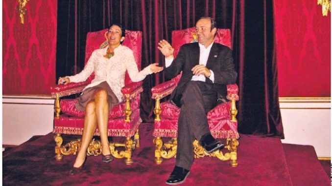 A photo of Ghislaine Maxwell and Kevin Spacey sitting on Queen Elizabeth's throne in Buckingham Palace has emerged, raising serious questions about pedophilia in elite circles and plunging the Royal Family into crisis.