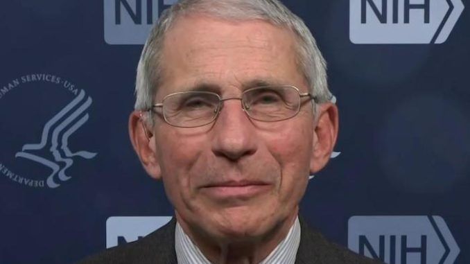 Dr. Anthony Fauci warns Americans may have to wear masks into 2022
