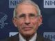 Dr. Anthony Fauci warns Americans may have to wear masks into 2022