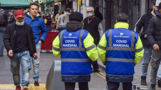 UK government hiring COVID marshals to patrol the streets until 2023