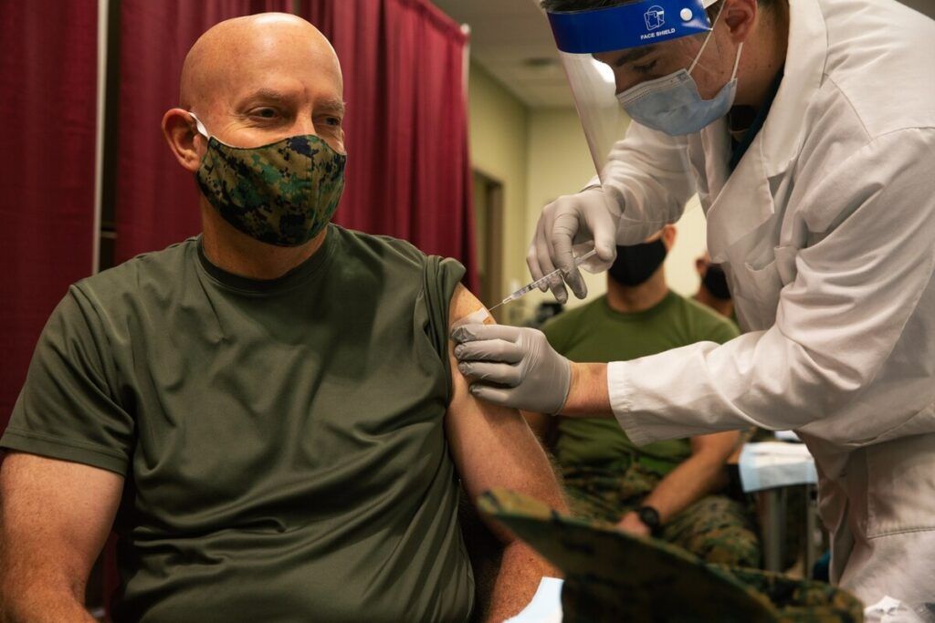 Marine having covid vaccine