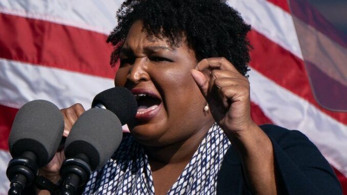 Stacey Abrams warns the insurrection is still happening