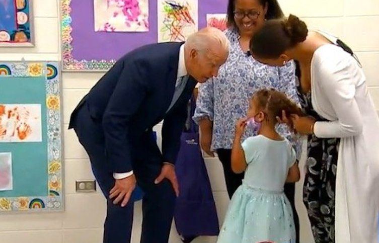 Biden caught on camera creeping on a 4 year old girl