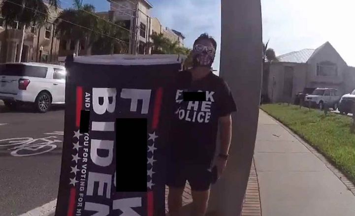 Trump supporter prosecuted and fined for waving F-Biden flag