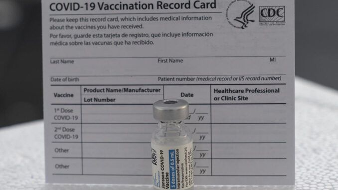 cdc covid vaccine record