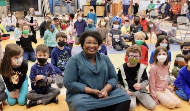 Stacey Abrams deletes photo showing herself unmasked surrounded by masked children