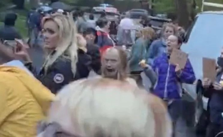 Demon spotted in crowd protesting outside John Roberts' home