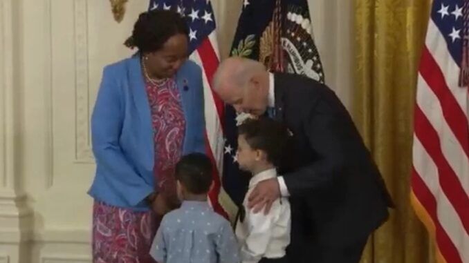 President Joe Biden caught on camera groping a little boy