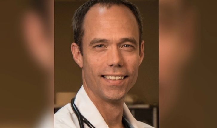 Fully jabbed chief of medicine dies 'suddenly and unexpectedly'