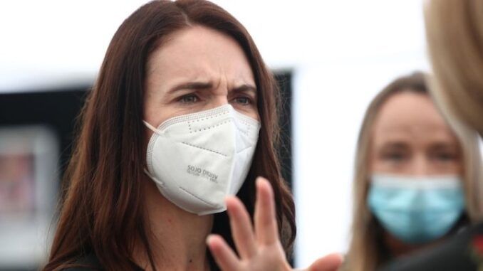 Jacinda Ardern baffled as COVID infections and deaths soar in new zealand, despite strict mask mandate