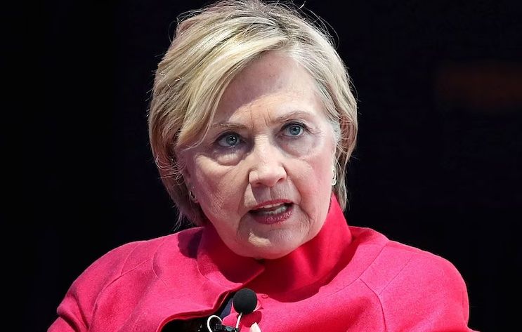 Hillary Clinton trembles with fear as crowd chant 'war criminal' to her face