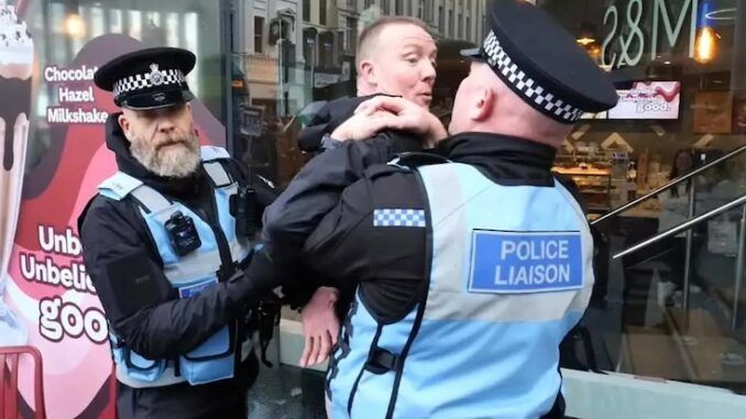 UK police arresting citizens who display British flags in public