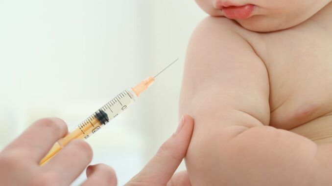 Baby having vaccine