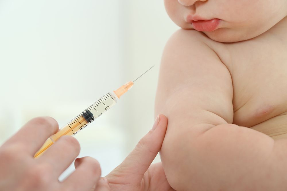 Baby having vaccine