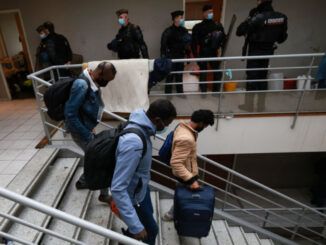 migrants evicted from squat