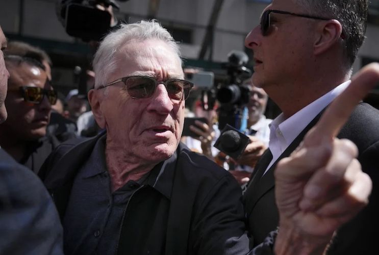 Robert Niro explodes with rage as crowd chant 'your movies suck' during Biden event.