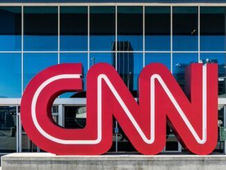 CNN threatens to shut down pro-Trump accounts who cover the presidential debate on social media.